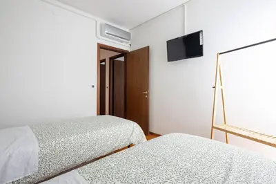 Letto o letti in una camera di Casa Genny