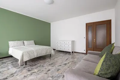 Letto o letti in una camera di Casa Genny