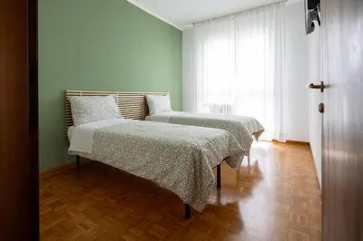Letto o letti in una camera di Casa Genny
