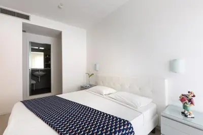 Letto o letti in una camera di Hotel Cavallino Bianco
