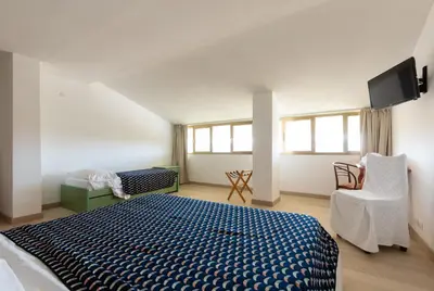 Letto o letti in una camera di Hotel Cavallino Bianco