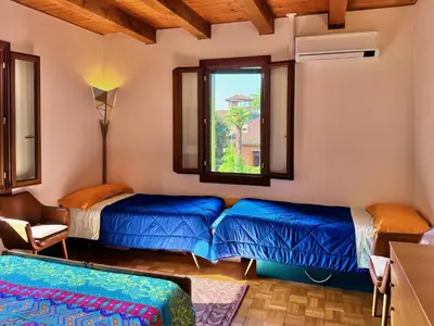 Letto o letti in una camera di Luce Fantasia e TV 70p a 2 minuti dalla spiaggia