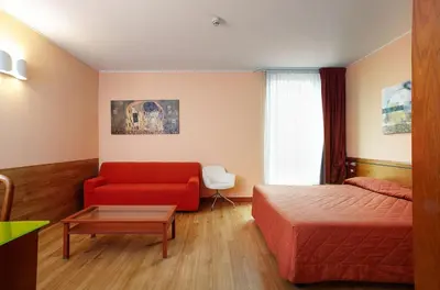 Letto o letti in una camera di Primhotel