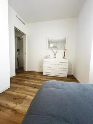 Letto o letti in una camera di Casa Umberto