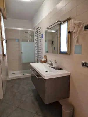 Bagno di DB Apartments - Il Rifugio