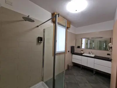 Bagno di DB Apartments - Il Rifugio