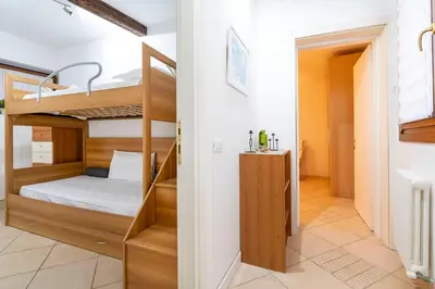 Letto o letti in una camera di Ca' Spirito Santo