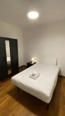 Letto o letti in una camera di Welc-ōM Rendez Vous Conselve