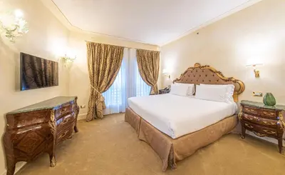 Letto o letti in una camera di Hotel Villa Barbarich
