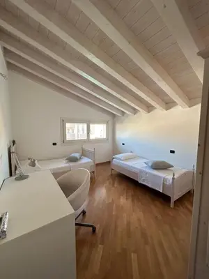 Letto o letti in una camera di Villa con piscina vicino Venezia - Cà Spolaor