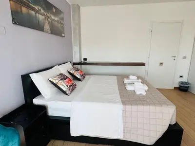 Letto o letti in una camera di MMM HOME Train Station 4