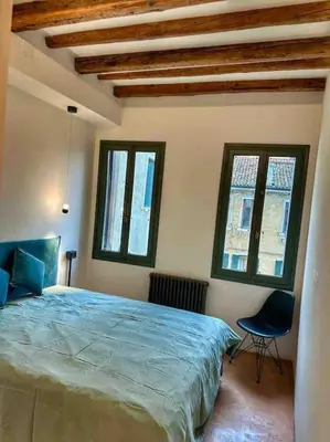 Letto o letti in una camera di Ca' Rolina a Venezia-Cannaregio