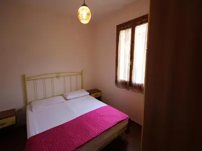 Letto o letti in una camera di Comfy flat in a quiet area of Rosolina