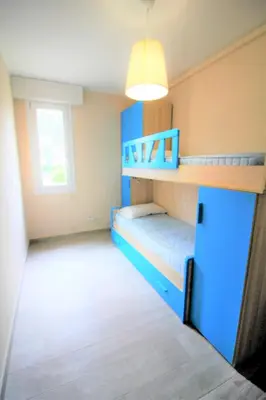 Letto o letti in una camera di Enjoy some charming and natural time in Rosolina