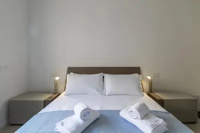 Letto o letti in una camera di Ca' Milla 1 by WelcHome
