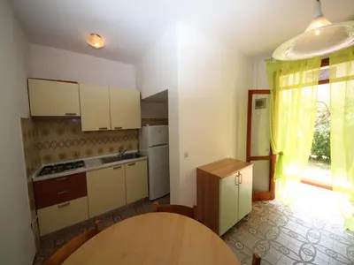 Cucina o angolo cottura di Functional flat in a peaceful area of Rosolina