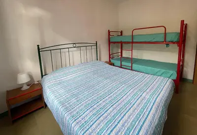 Letto o letti in una camera di Accommodation with shared garden close to the sea