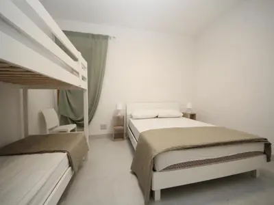 Letto o letti in una camera di Modern apartment near the beach