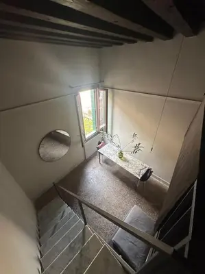 Letto o letti in una camera di Biennale Do Pozzi Family Apartment
