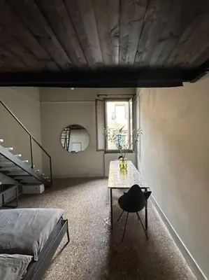 Letto o letti in una camera di Biennale Do Pozzi Family Apartment