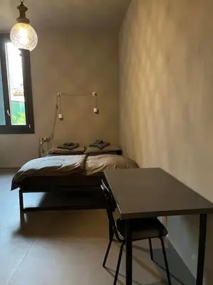 Letto o letti in una camera di Biennale Do Pozzi Family Apartment