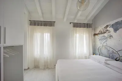 Letto o letti in una camera di Maison sul Pozzo, Venicevillas