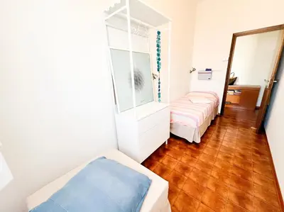 Letto o letti in una camera di Fronte Mare, Piscina - RESIDENCE GRIFONE