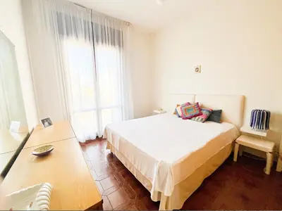 Letto o letti in una camera di Fronte Mare, Piscina - RESIDENCE GRIFONE