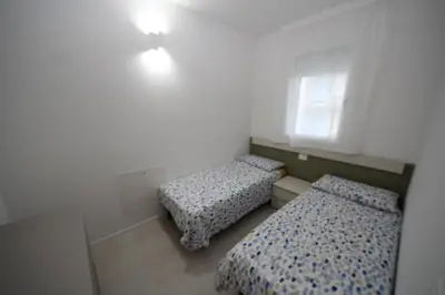 Letto o letti in una camera di Fully renovated flat for 4 in Rosolina Mare