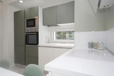 Cucina o angolo cottura di Modernity and comfort for four guests in Rosolina