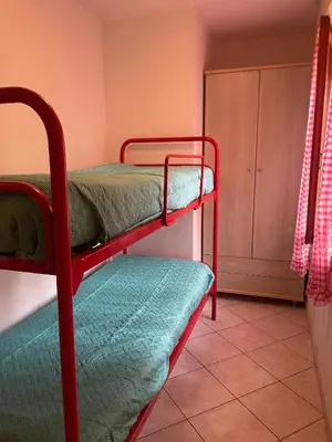 Letto o letti in una camera di Bright flat in Rosolina