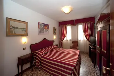 Letto o letti in una camera di Hotel Fontana