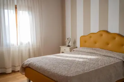 Letto o letti in una camera di Ghisolana Agriturismo al Capitello