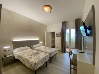 Letto o letti in una camera di Hotel Lanterna Padova