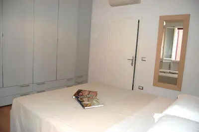 Letto o letti in una camera di Casa Roberto