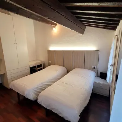 Letto o letti in una camera di Cà Lori