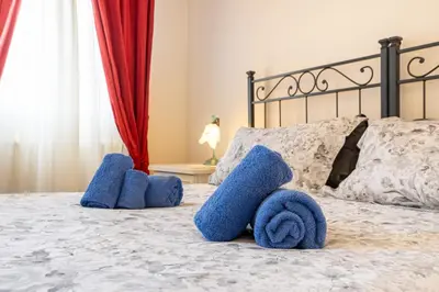 Letto o letti in una camera di Vista Canale, 4 ospiti, 2 camere e 2 bagni