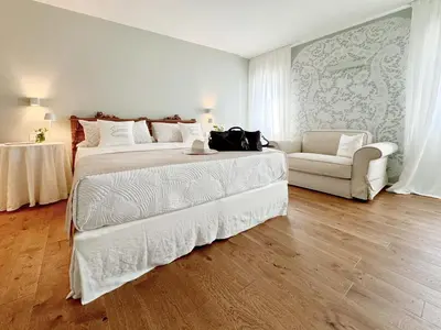 Letto o letti in una camera di B&B Carmen Garden
