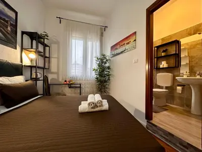 Letto o letti in una camera di B&B CasaMia