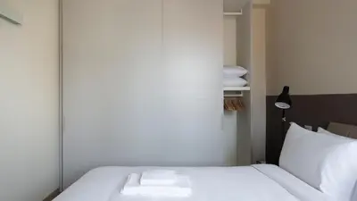Letto o letti in una camera di Erïk Langer Pedrocchi Suites