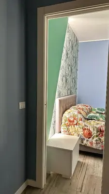 Letto o letti in una camera di PARISI - VENEZIA Aleardi 1