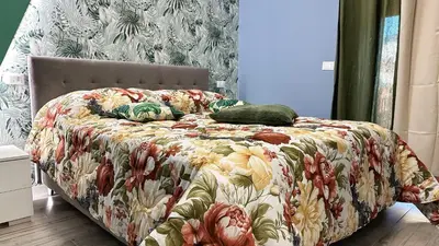 Letto o letti in una camera di PARISI - VENEZIA Aleardi 1