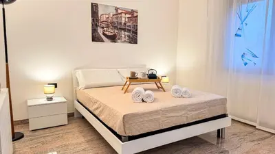 Letto o letti in una camera di Casa Micio by Ca-Sa Check