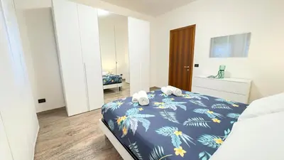 Letto o letti in una camera di Casa Micio by Ca-Sa Check