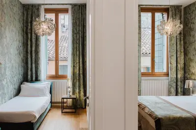 Letto o letti in una camera di Dimora Capuleti