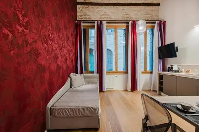 Letto o letti in una camera di Dimora Capuleti