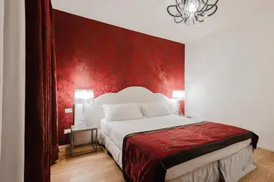 Letto o letti in una camera di Dimora Capuleti