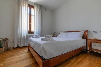 Letto o letti in una camera di Santa Caterina Nest by WelcHome