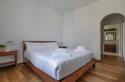 Letto o letti in una camera di Santa Caterina Nest by WelcHome