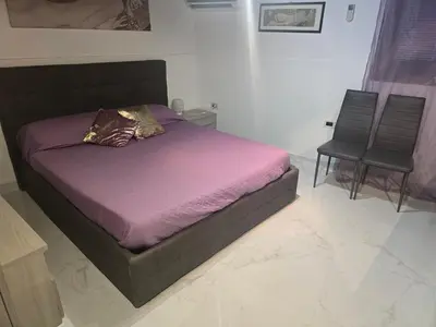 Letto o letti in una camera di I Gioielli del Doge - Ametista